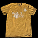 Yellow t-shirt with graphic design on a textured surface