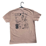 Brown t-shirt with graphic design on a hanger against a textured gray background